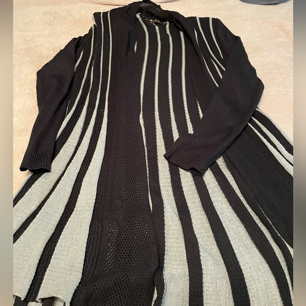 Beautiful lightweight black and white sweater.